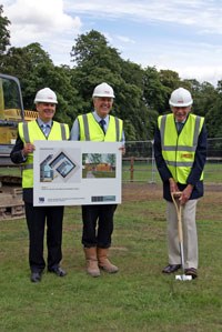 The AHT’s Honorary Vice President, The Rt Hon the Lord Fairhaven KStJ JP DL, cuts the first sod of the new cancer centre 