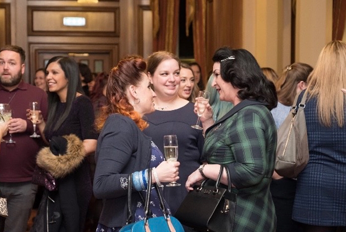 Photo shows Lesley Moore talking with Louise O’Dwyer at an event last year